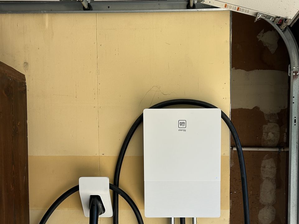 GM Energy bidirectional charging equipment installed in a residential garage