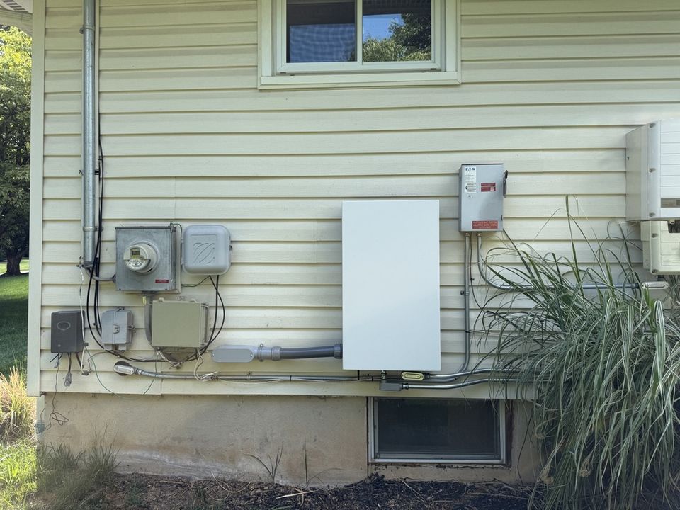 GM Energy V2H equipment integrated with residential electrical service equipment